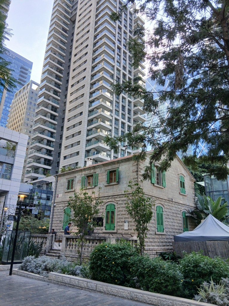 Green shutters, and Sarona Market on the left