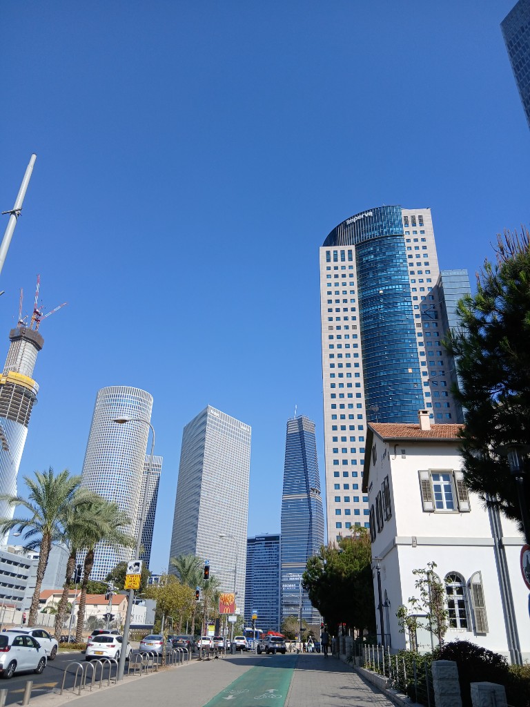 The Azrieli Towers and a small white house