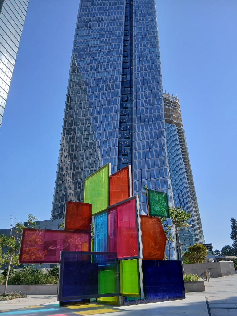 Coloured glass in front of a tower