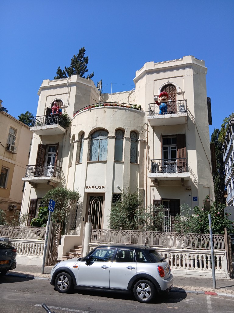 Spider-Man and Mario on the balconies