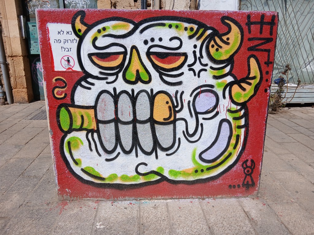 A painted monster and the sign: 
