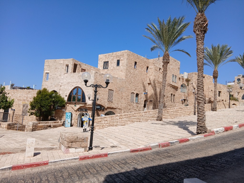 Stone houses, stairs and palms in old Yafo